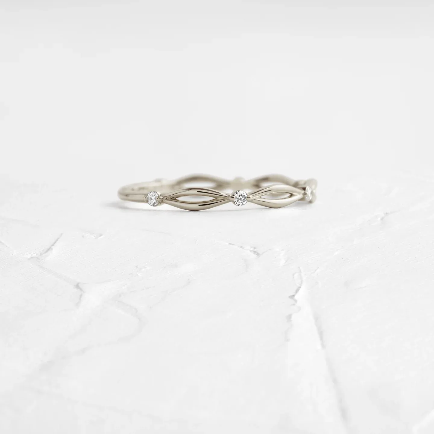 0.12CTW Twisted Natural Diamond Round Cut Wedding Ring