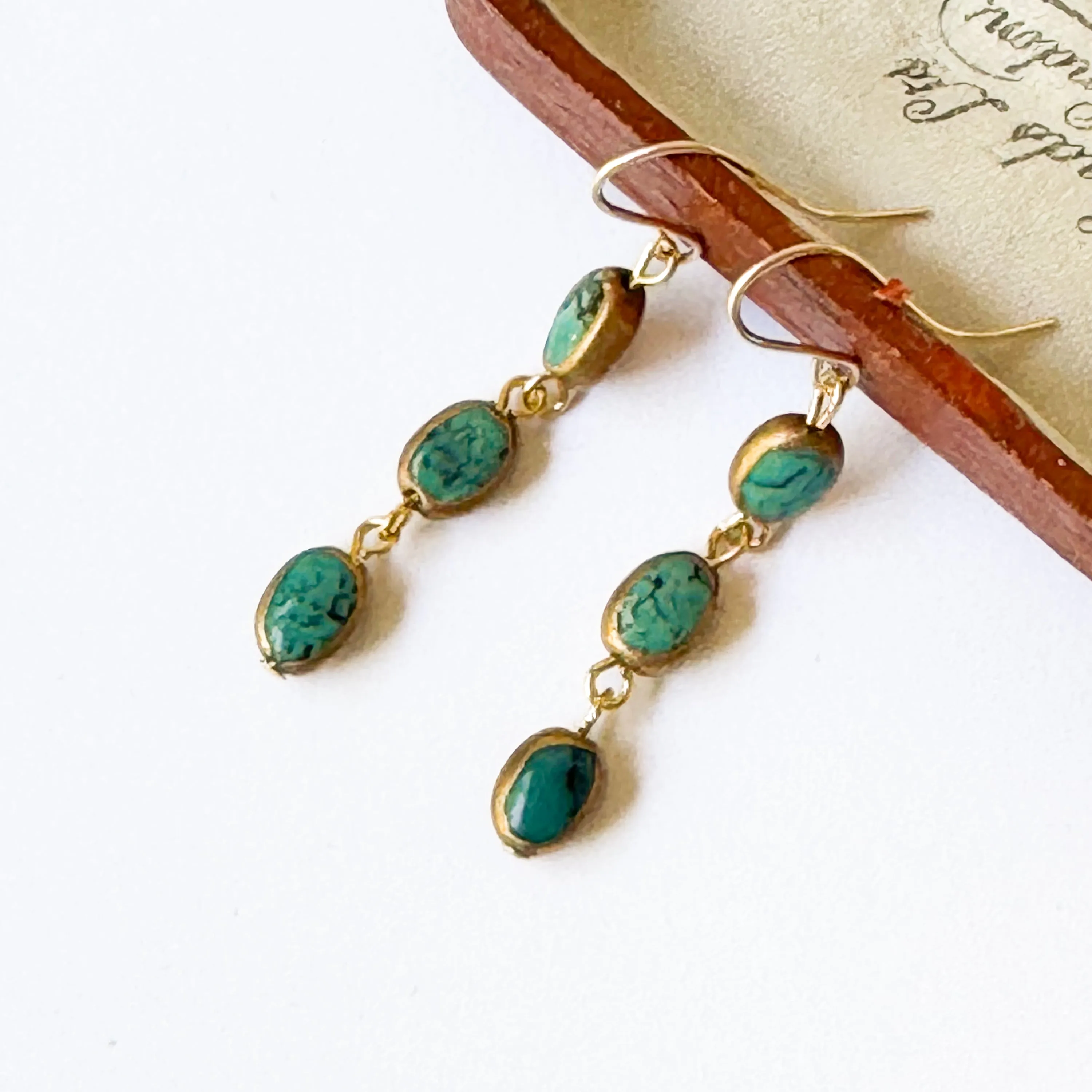 Long Turquoise dipped in gold earrings